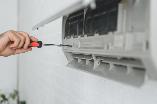 repairing and servicing an air conditioner